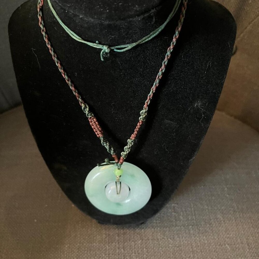 Jadite green and lavender pendant on woven cord